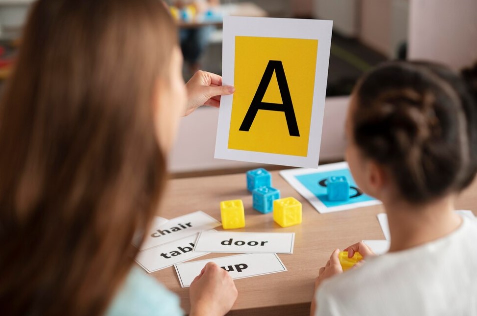 Psychologist helping a littl